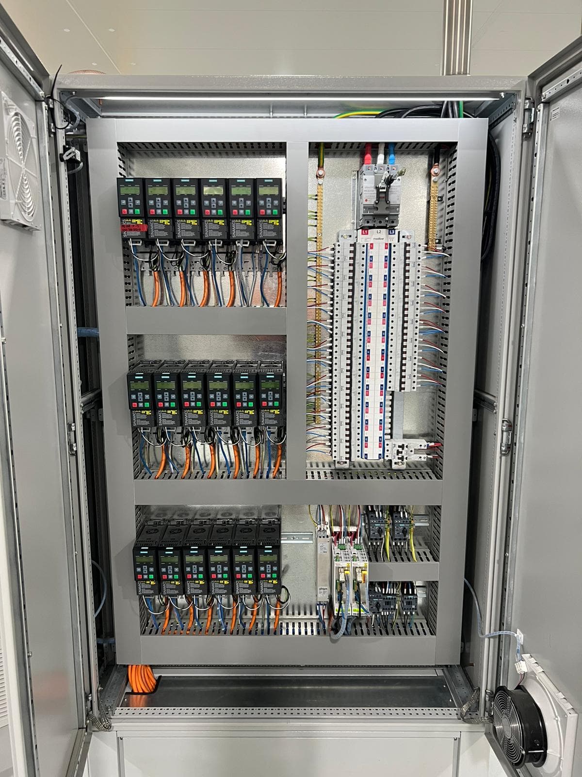 Field wiring terminated at a conveyor sensor block